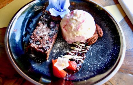 Chocolate and prune brownie with vanilla ice cream